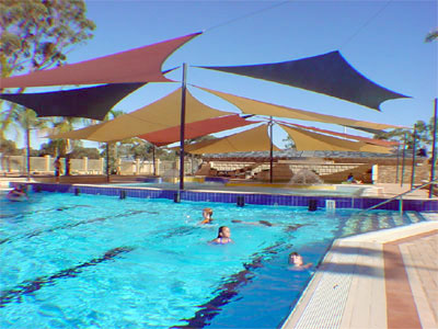 shade sails over pools